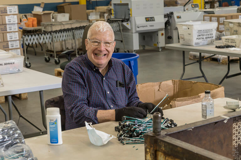 Baker Employee Assembling Products