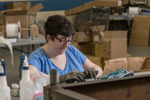 Baker Employee Assembling Products