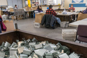 Box of parts ready for Baker Employees to sort and pack