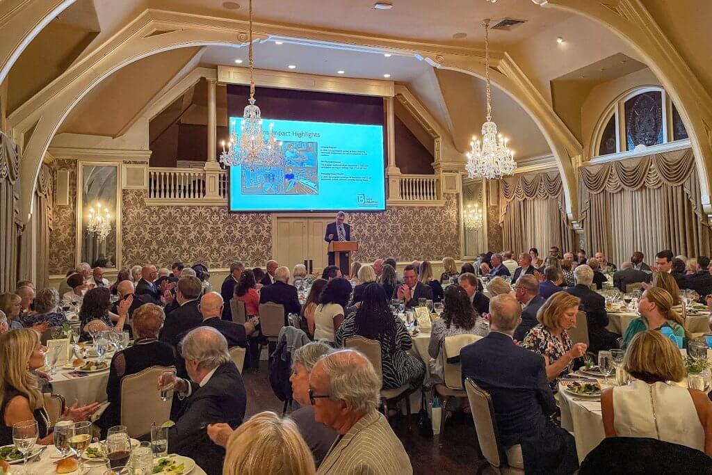 Guests seated for dinner in the ballroom at the 2025 Baker Industries Gala
