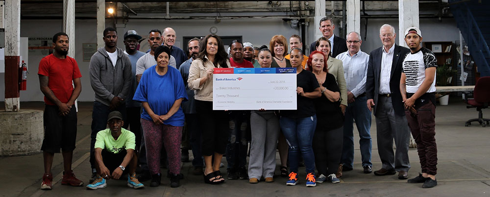 Baker industries receiving check from Bank of america