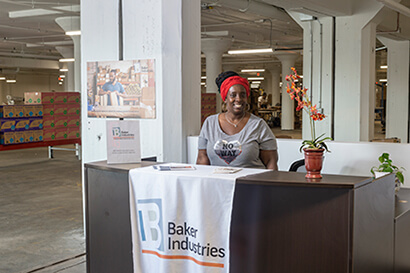 Baker Employee greets visitors at our warehouse