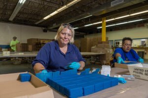 Baker Employee packing boxes