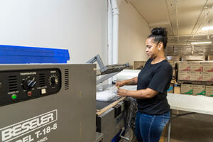 Baker Employees Shrink Wrapping