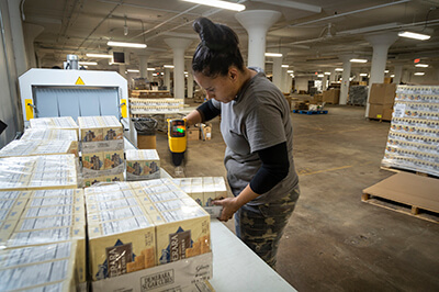 Baker Employees Shrink Wrapping